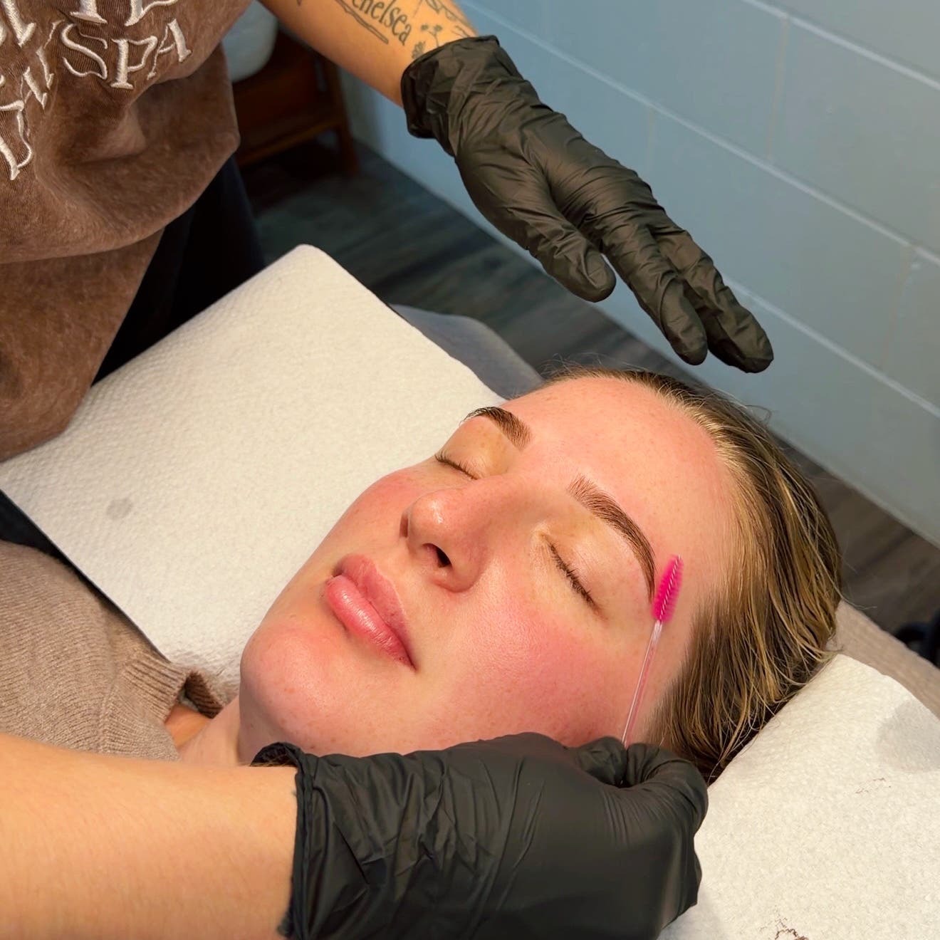 A brow treatment in progress at SHE Day Spa