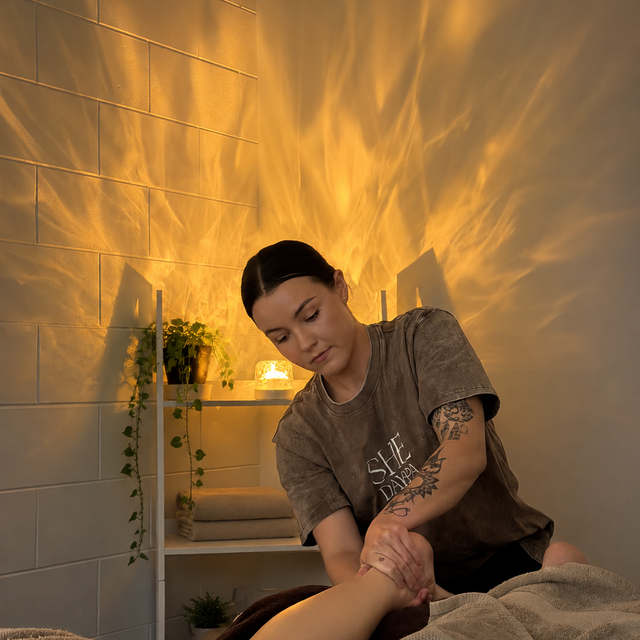 A massage at SHE Day Spa by candlelight